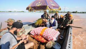 Army personnel rescue Guru Granth Sahib from heavily flooded Motipur Khalsa village, near Phillaur, in Jalandhar district of Punjab, August 19, 2019.(Pardeep Pandit / HT Photo) Army personnel rescue Guru Granth Sahib from heavily flooded Motipur Khalsa village, near Phillaur, in Jalandhar district of Punjab, August 19, 2019.(Pardeep Pandit / HT Photo)
