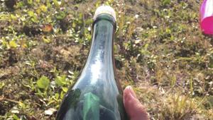 A man gathering firewood in Alaska discovered a bottle with a handwritten message inside wishing the finder “happy sailing” more than 50 years after it was dropped into the sea by a Russian sailor.(AP Photo) A man gathering firewood in Alaska discovered a bottle with a handwritten message inside wishing the finder “happy sailing” more than 50 years after it was dropped into the sea by a Russian sailor.(AP Photo)