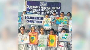 Students displaying their posters on disaster management. Students displaying their posters on disaster management.