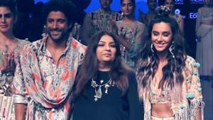 <p>Actor Farhan Akhtar, alongwith his girlfriend Shibani Dandekar walked the ramp on the second day of the ongoing Lakme Fashion Week 2019 in Mumbai and wowed everyone with their public display of love and affection, apart from the grace and style that came with their Bohemian dresses. Farhan and Shibani were the showstoppers for designer Payal Singhal. The couple wore colour-coordinated ethnic dresses for their ramp walk -Farhan wore an off-white kurta-pajama with blue and orange print and paired it with a stole of the same print. Shibani also had the same colour and print on her lehenga that was paired with a small shrug draped around her shoulders.</p>
