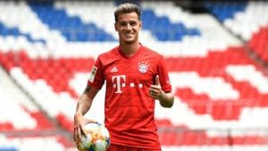 Brazilian midfielder Philippe Coutinho, the new recruit of German first division Bundesliga football club FC Bayern Munich, poses during his presentation on August 19, 2019 in Munich.(AFP)
