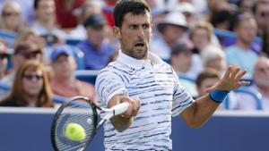 Novak Djokovic, of Serbia, hits a forehand to Daniil Medvedev, of Russia.(AP) Novak Djokovic, of Serbia, hits a forehand to Daniil Medvedev, of Russia.(AP)