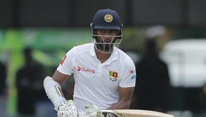 Karunaratne, fresh from a match-winning century in the first Test in Galle last week last week, hit six boundaries during his 100-ball stay in overcast conditions.(AP) Karunaratne, fresh from a match-winning century in the first Test in Galle last week last week, hit six boundaries during his 100-ball stay in overcast conditions.(AP)