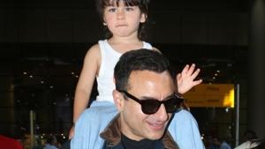 Saif Ali Khan and his son Taimur Ali Khan seen at Chhatrapati Shivaji International Airport.(IANS) Saif Ali Khan and his son Taimur Ali Khan seen at Chhatrapati Shivaji International Airport.(IANS)