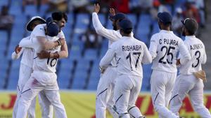 India's Ishant Sharma is embraced captain Virat Kohli after dismissing West Indies' Kemar Roach.(AP) India's Ishant Sharma is embraced captain Virat Kohli after dismissing West Indies' Kemar Roach.(AP)