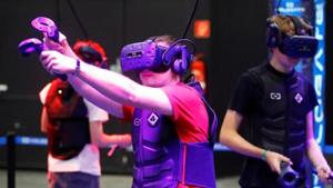 A gamer wears augmented reality goggles to play a shooting game during Europe's leading digital games fair Gamescom, which showcases the latest trends of the computer gaming scene in Cologne, Germany, August 21, 2019. REUTERS/Wolfgang Rattay(REUTERS) A gamer wears augmented reality goggles to play a shooting game during Europe's leading digital games fair Gamescom, which showcases the latest trends of the computer gaming scene in Cologne, Germany, August 21, 2019. REUTERS/Wolfgang Rattay(REUTERS)