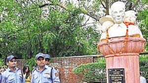 Security personnel have been deployed to guard the statue of Veer Savarkar, Bhagat Singh and Subhash Chandra Bose at Arts Faculty, North Campus in New Delhi(Sanchit Khanna/HT PHOTO)