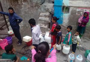 People standing in the queue to fill water from natural water source in Sanjauli area of Shimla district on Saturday.(HT Photo) People standing in the queue to fill water from natural water source in Sanjauli area of Shimla district on Saturday.(HT Photo)