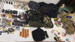 The police team seized explosives , ammunition and documents from the site of the encounter.(HT PHOTO) The police team seized explosives , ammunition and documents from the site of the encounter.(HT PHOTO)