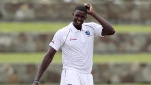 West Indies' captain Jason Holder scratches his head during day one of the first Test cricket match against India at the Sir Vivian Richards cricket ground in North Sound, Antigua and Barbuda, Thursday, Aug. 22, 2019.(AP) West Indies' captain Jason Holder scratches his head during day one of the first Test cricket match against India at the Sir Vivian Richards cricket ground in North Sound, Antigua and Barbuda, Thursday, Aug. 22, 2019.(AP)