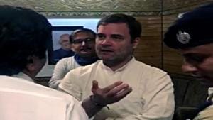 Congress leader Rahul Gandhi in conversation with opposition party leaders at Srinagar Airport in Srinagar on Saturday. (ANI Photo)