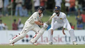 New Zealand's BJ Watling, left, plays a shot as Sri Lanka's Lahiru Thirimanne watches.(AP) New Zealand's BJ Watling, left, plays a shot as Sri Lanka's Lahiru Thirimanne watches.(AP)