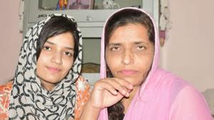 Irm Shamim (left) with her mother. Shamim is the first girl from Gujjar community in Rajouri to crack AIIMS MBBS exam.(HT Photo) Irm Shamim (left) with her mother. Shamim is the first girl from Gujjar community in Rajouri to crack AIIMS MBBS exam.(HT Photo)