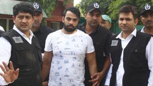 The Special Task Force (STF) Haryana police with gangster Kaushal who was arrested from IGI Airport early morning, at Police Commissioner Office, in Faridabad, Haryana, August 26, 2019.(Yogendra Kumar/HT PHOTO) The Special Task Force (STF) Haryana police with gangster Kaushal who was arrested from IGI Airport early morning, at Police Commissioner Office, in Faridabad, Haryana, August 26, 2019.(Yogendra Kumar/HT PHOTO)
