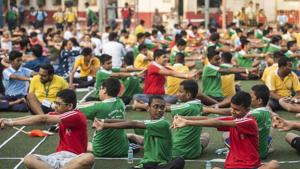 Government primary schools in UP participate in a 15-minute yoga session during the morning assembly. (Representational image) Government primary schools in UP participate in a 15-minute yoga session during the morning assembly. (Representational image)