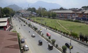 Vehicles move on the road after the ease of restriction in Srinagar on Monday.(ANI Photo) Vehicles move on the road after the ease of restriction in Srinagar on Monday.(ANI Photo)