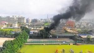 Illegal dumping and burning of garbage have been a constant reminder to the residents of Hinjewadi of the inept handling of solid waste management in the area.(HT PHOTO)