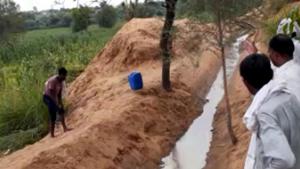 Villagers see the water flow in canal in Hisar.(HT Photo) Villagers see the water flow in canal in Hisar.(HT Photo)