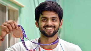 B Sai Praneeth displays the bronze medal.(PTI) B Sai Praneeth displays the bronze medal.(PTI)