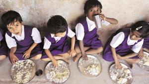 Students having mid-day meal(AFP) Students having mid-day meal(AFP)