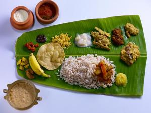 A traditional Onam Sadya is served on a banana leaf, and should have at least 23 items. Now that’s what I call a feast!(iStock) A traditional Onam Sadya is served on a banana leaf, and should have at least 23 items. Now that’s what I call a feast!(iStock)