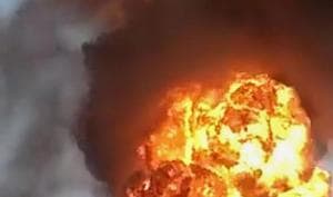 Fire rises out of a burning chemical factory after a cylinder explosion in Dhule, Saturday, Aug 31, 2019(PTI Photo) Fire rises out of a burning chemical factory after a cylinder explosion in Dhule, Saturday, Aug 31, 2019(PTI Photo)