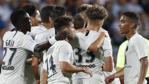 PSG's players celebrate a goal in the first half of the French League One soccer match against Metz.(AP) PSG's players celebrate a goal in the first half of the French League One soccer match against Metz.(AP)