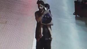 The three-year-old was sleeping with her mother at the railway station on July 25 when she was picked up by Rinku Sahu, seen here in CCTV footage, walking away with the sleeping girl in his arms.(Credit : Railway Police / Screengrab) The three-year-old was sleeping with her mother at the railway station on July 25 when she was picked up by Rinku Sahu, seen here in CCTV footage, walking away with the sleeping girl in his arms.(Credit : Railway Police / Screengrab)