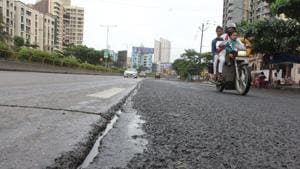 The police said the duo, who were not wearing helmets, had fallen down after the scooter rider skid on a road that was wet due to heavy rain.(Praful Gangurde/HT File Photo) The police said the duo, who were not wearing helmets, had fallen down after the scooter rider skid on a road that was wet due to heavy rain.(Praful Gangurde/HT File Photo)