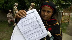 A woman displays a document that shows inclusion of her name in the final list of the National Register of Citizens (NRC), Pabhokati village, Morigaon district, Assam(AP) A woman displays a document that shows inclusion of her name in the final list of the National Register of Citizens (NRC), Pabhokati village, Morigaon district, Assam(AP)