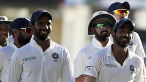 India's Jasprit Bumrah, center, leaves the field with teammates after day two of the second Test.(AP)