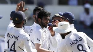 India's Jasprit Bumrah is greeted by teammates after taking a wicket.(AP) India's Jasprit Bumrah is greeted by teammates after taking a wicket.(AP)