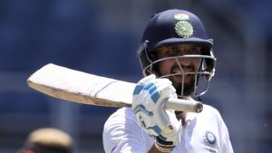 India's Ishant Sharma celebrates after he scored a half century against West Indies.(AP) India's Ishant Sharma celebrates after he scored a half century against West Indies.(AP)