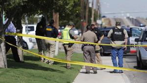 Authorities cordon off a part of the sidewalk in the 5100 block of E. 42nd Street in Odessa, Texas, Saturday, Aug. 31, 2019. Several people were dead after a gunman who hijacked a postal service vehicle in West Texas shot more than 20 people, authorities said Saturday. The gunman was killed and a few law enforcement officers were among the injured. (Mark Rogers/Odessa American via AP)(AP) Authorities cordon off a part of the sidewalk in the 5100 block of E. 42nd Street in Odessa, Texas, Saturday, Aug. 31, 2019. Several people were dead after a gunman who hijacked a postal service vehicle in West Texas shot more than 20 people, authorities said Saturday. The gunman was killed and a few law enforcement officers were among the injured. (Mark Rogers/Odessa American via AP)(AP)