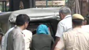 A man who tried to enter Parliament on Monday allegedly with a knife being whisked away by police .(ANI photo) A man who tried to enter Parliament on Monday allegedly with a knife being whisked away by police .(ANI photo)