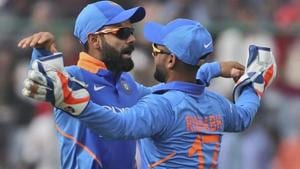 Indian cricket captain Virat Kohli, left, celebrates with teammate Rishabh Pant.(AP) Indian cricket captain Virat Kohli, left, celebrates with teammate Rishabh Pant.(AP)
