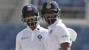 India's Ajinkya Rahane, left, is congratulated by teammate India's Hanuma Vihari.(AP) India's Ajinkya Rahane, left, is congratulated by teammate India's Hanuma Vihari.(AP)