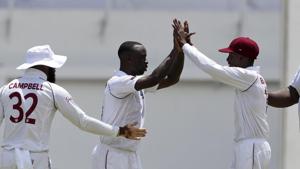 West Indies' Kemar Roach celebrates dismissing India's captain Virat Kohli for a first-ball duck )(AP) West Indies' Kemar Roach celebrates dismissing India's captain Virat Kohli for a first-ball duck )(AP)