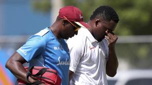 West Indies' batsman Darren Bravo leaves the field.(AP) West Indies' batsman Darren Bravo leaves the field.(AP)
