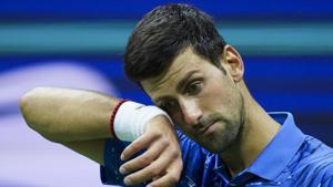 Novak Djokovic, of Serbia, reacts after losing a point against Stan Wawrinka, of Switzerland(AP) Novak Djokovic, of Serbia, reacts after losing a point against Stan Wawrinka, of Switzerland(AP)