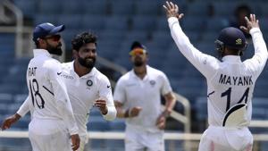 India's Ravindra Jadeja, second from left, celebrates taking the wicket of West Indies' Jahmar Hamilton.(AP) India's Ravindra Jadeja, second from left, celebrates taking the wicket of West Indies' Jahmar Hamilton.(AP)