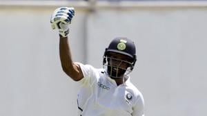 India's Hanuma Vihari celebrates after he scored a century against West Indies.(AP) India's Hanuma Vihari celebrates after he scored a century against West Indies.(AP)