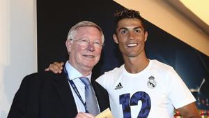 Real Madrid's Cristiano Ronaldo receives his man of the match award from Sir Alex Ferguson after the Champions League final soccer match between Juventus and Real Madrid at the Millennium stadium in Cardiff, Wales Saturday June 3, 2017. (AP Photo/Jan Kruger, UEFA via AP)(AP) Real Madrid's Cristiano Ronaldo receives his man of the match award from Sir Alex Ferguson after the Champions League final soccer match between Juventus and Real Madrid at the Millennium stadium in Cardiff, Wales Saturday June 3, 2017. (AP Photo/Jan Kruger, UEFA via AP)(AP)