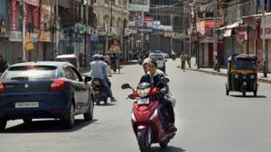 Commuters seen on a road in Kashmir valley after abrogation of the provisions of Article of 370.(PTI photo ( Representational image)) Commuters seen on a road in Kashmir valley after abrogation of the provisions of Article of 370.(PTI photo ( Representational image))