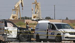 FILE - In this Sunday, Sept. 1, 2019, file photo, law enforcement officials process the crime scene from Saturday's shooting which ended with the shooter, Seth Ator, being shot dead by police in a stolen mail van, right, in Odessa, Texas.(AP Photo) FILE - In this Sunday, Sept. 1, 2019, file photo, law enforcement officials process the crime scene from Saturday's shooting which ended with the shooter, Seth Ator, being shot dead by police in a stolen mail van, right, in Odessa, Texas.(AP Photo)