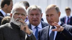 Russian President Vladimir Putin and Indian Prime Minister Narendra Modi visit Zvezda shipyard, accompanied by Rosneft Russian oil giant chief Igor Sechin, ahead of the Eastern Economic Forum in Vladivostok, Russia.(Reuters) Russian President Vladimir Putin and Indian Prime Minister Narendra Modi visit Zvezda shipyard, accompanied by Rosneft Russian oil giant chief Igor Sechin, ahead of the Eastern Economic Forum in Vladivostok, Russia.(Reuters)