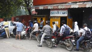 Two-wheeler riders line-up for pollution check at a petrol pump opposite the Old CP Office, on Wednesday, as traffic police started enforcing the amended Motor Vehicle Act.(Yogendra Kumar/HT PHOTO) Two-wheeler riders line-up for pollution check at a petrol pump opposite the Old CP Office, on Wednesday, as traffic police started enforcing the amended Motor Vehicle Act.(Yogendra Kumar/HT PHOTO)