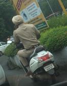 A Twitter user posted this image of the cop violating traffic rules.(HT photo) A Twitter user posted this image of the cop violating traffic rules.(HT photo)