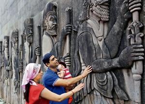 A Parsi couple prays to the guardians of the fire temple at Tardeo in Mumbai on Navroz in 2015.(Kunal Patil/Hindustan Times) A Parsi couple prays to the guardians of the fire temple at Tardeo in Mumbai on Navroz in 2015.(Kunal Patil/Hindustan Times)