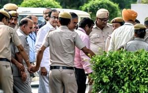 CBI Officials arrive with P. Chidambaram at Rouse Avenue District Court Complex in New Delhi, on Thursday.(ANI Photo)